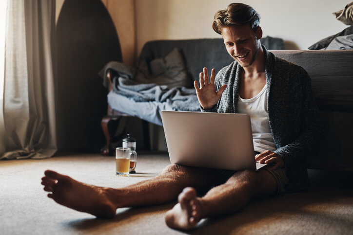 working from home on the floor